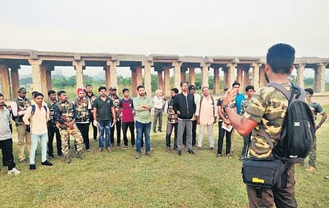 Trained guides from Tourism and Forest departments during a trial eco-heritage walk in Hampi | Express
