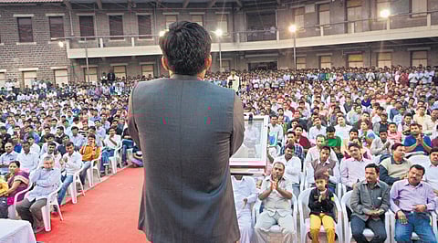 IAS officer Ramesh Gholap, who is still known as ‘Ramu’ in his native Mahagaon village in Solapur, addresses a gathering | express