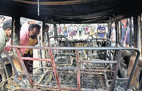 The police jeep which was burnt by migrant workers (Photo | EPS, A Sanesh)
