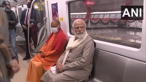 PM Narendra Modi takes a ride after inaugurating the completed section of the Kanpur Metro Rail Project on Tuesday. (Photo | Twitter)