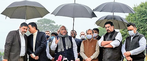 Congress MP Mallikarjun Kharge addresses the media with other party leaders outside Parliament on Thursday. (Photo | Shekhar Yadav/EPS)