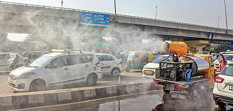 An anti-smog gun sprays water droplets to curb air pollution at Delhi- Gurugram Expressway. (File Photo | PTI)