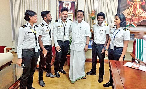 SC/ST Welfare Minister K Radhakrishnan with the beneficiaries of the scheme