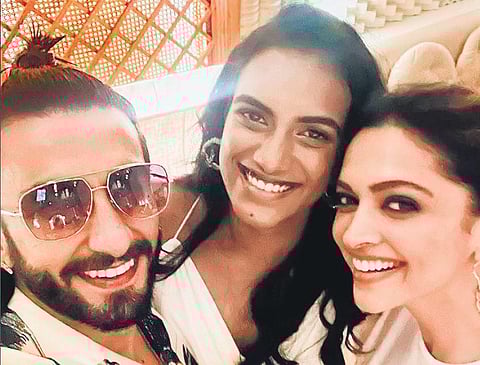 Olympic medallist PV Sindhu with Hindi film actors Deepika Padukone and Rnaveer Singh