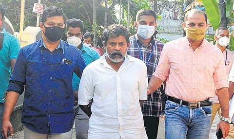 Ripper Jayanandan being taken to the house at Ponekkara in Kochi as part of evidence collection on Wednesday | EXPRESS