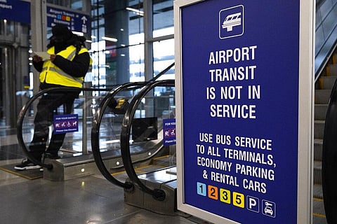 An information sign is displayed at O'Hare International Airport in Chicago, Ill., Tuesday, Dec. 28, 2021. (Photo | AP)