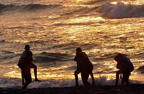 Women working out by carrying each other on their backs at the sunrise in Visakhapatnam beach, Andhra Pradesh (File photo)