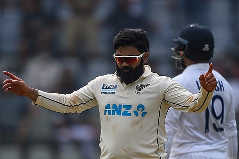 New Zealand's Ajaz Patel (L) celebrates after a dismissal during 2nd day of second Test against India at Wankhede Stadium, Mumbai on December 4, 2021. (Photo | AFP)