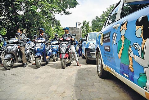 Covid Vaccine Express Vehicles, which were launched at the BBMP office in Bengaluru, makes its rounds in the city. (Photo | Shriram BN, EPS)