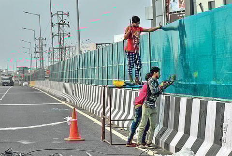 Noise barrier system being installed on the recently inaugurated Benz Circle flyover in Vijayawada on Friday | Prasant Madugula