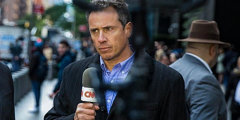 FILE - The then CNN correspondent Chris Cuomo during on air report in front of the Time Warner Building, where NYPD personnel removed an explosive device on Oct. 24, 2018, in New York. (Photo | AP)