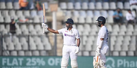 India's Mayank Agarwal celebrates his fifty during the 3rd day of the 2nd cricket test match between India and New Zealand at Wankhede stadium, in Mumbai, Sunday, Dec. 5, 2021. (Photo | AP)