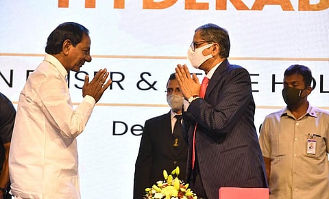 Chief Minister K Chandrasekhar Rao welcomes CJI NV Ramana to the International Arbitration & Mediation Centre curtain raiser in Hyderabad on Saturday. (Photo | Express)