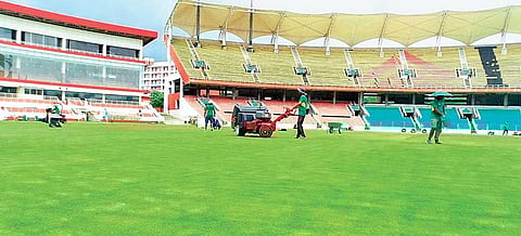 Workers give final touches to the Greenfield International Stadium ahead of the Vijay Hazare Trophy. (Photo | EPS)