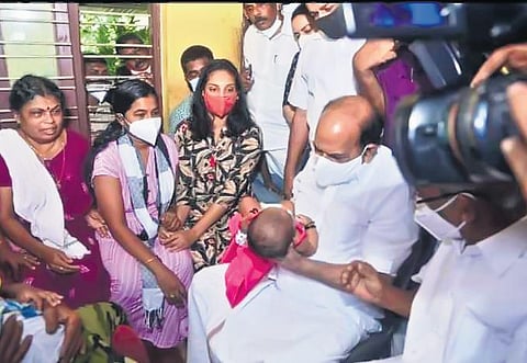 CPM state secretary Kodiyeri Balakrishnan at the house of P B Sandeep Kumar in Tiruvalla on Sunday. The party’s Peringara local secretary was killed on Thursday.