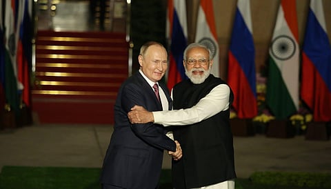 Russian President Vladimir Putin shakes hands with Prime Minister Narendra Modi before their meeting at Hyderabad House in New Delhi (Photo | EPS/Shekhar Yadav)