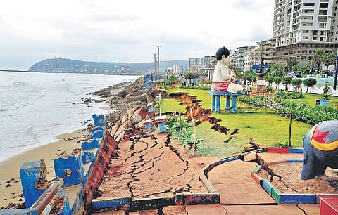 A portion of the children’s park at beach collapsed due to erosion caused by sea surge in Visakhapatnam on Sunday I G Satyanarayana