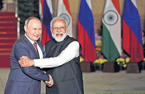 Prime Minister Narendra Modi greets visiting Russian President Vladimir Putin before their meeting at Hyderabad House in New Delhi on Monday. (Photo | Shekhar Yadav/EPS)