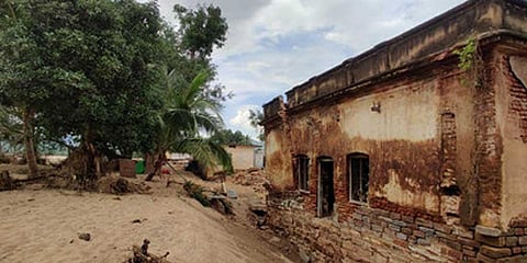Flash floods in the Cheyyeru river catchment area destroyed houses and displaced many homes in Thoguru Peta of Nandaluru, Rajampeta Mandal of Kadapa district. (Photo | Express)
