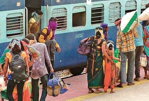 File photo of people migrating with children at Kantabanji railway station. (Photo | Express)