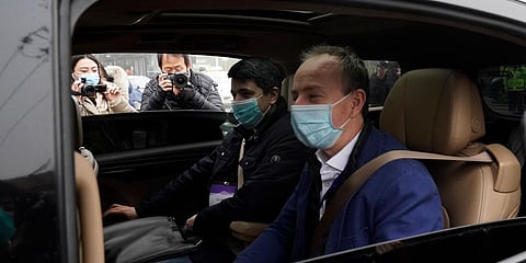 Members of a World Health Organization team arrive at the Hubei Center for Disease Control and Prevention in Wuhan in central China's Hubei province Monday, Feb. 1, 2021. (Photo | AP)