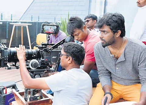 Director R Gopi on the sets of Naanum Single Thaan