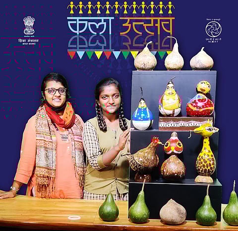 Chandana and her art teacher Sangeetha with the art works (Photo | Special arrangement)