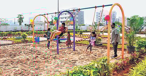 Children playing at a newly-inaugurated public park at Kanaka Durga Nagar in Vijayawada on Wednesday. (Photo | EPS)