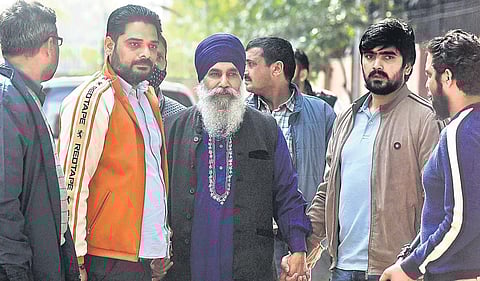 Iqbal Singh (Centre) is being brought to Special Cell office at Rohini after his arrest in New Delhi | Parveen Negi