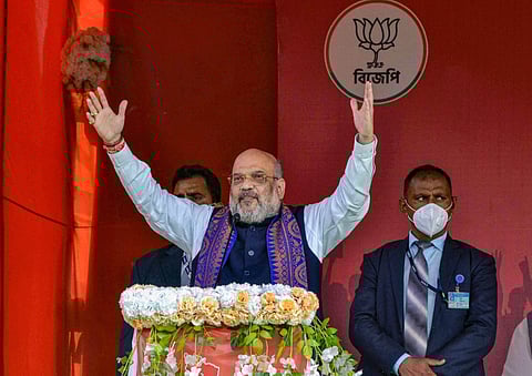 Union Home Minister Amit Shah addresses a public rally at Rashmela Mela maidan in Cooch Behar. (Photo| PTI)