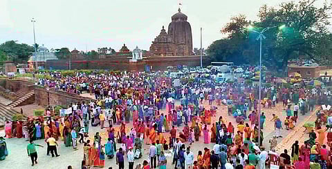 People lighting lamps outside the Lingaraj temple to mark protest against the draft heritage bylaws, in Bhubaneswar on Friday. (Photo| EPS)