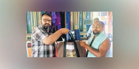 USA-based Viswa Veda Parayana Brindam, Hyderabad-based Veda Vyasa Varadhi and Tarani distribute ‘Swayampakam’ kit to an archaka I Express