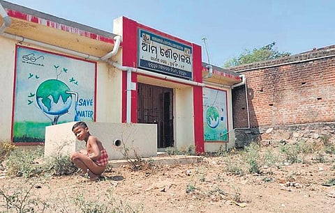 The locked toilet at Ganesh Nagar under Ward no 9 in Berhampur. (Photo | Express)