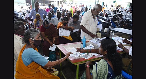 Senior citizens collecting their bus pass at Pallavan depot in Chennai. (Photo | R Satish Babu, EPS)