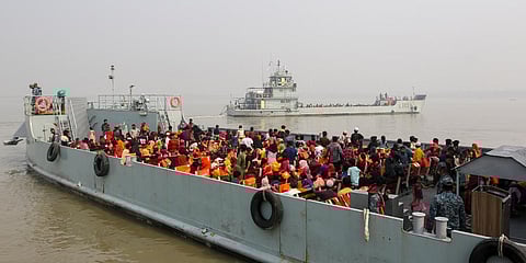 Rohingya refugees headed to the Bhasan Char island leave on navy vessels from the south eastern port city of Chattogram. (Photo| AP)