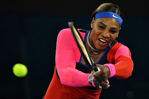 Serena Williams hits a return against Simona Halep during their women's singles quarter-final match on day nine of the Australian Open in Melbourne on February 16, 2021. (Photo | AFP)