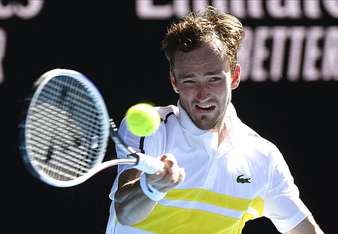 Russia's Daniil Medvedev hits a forehand return to compatriot Andrey Rublev during their quarterfinal match at the Australian Open tennis championship in Melbourne, Australia, Wednesday. (Photo | AP)