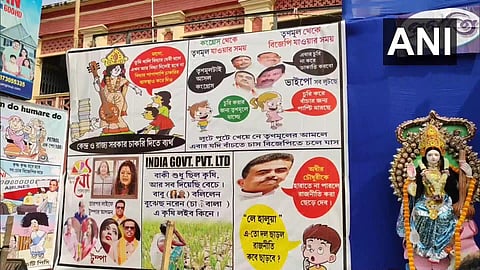 Political cartoons at a saraswathi puja pandal. (Photo | ANI)