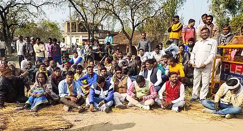 Locals stage a protest after bodies of two minor Dalit girls were found in a field and another in critical condition, near Baburaha village in Unnao district. (Photo | PTI)