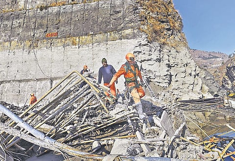 NDRF personnel carry out rescue and restoration work at Tapovan | Pti