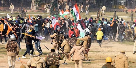 Police chase away protesters and farmers who had reached the Red Fort after the Republic Day parade in Delhi. (File Photo | Parveen Negi, EPS)