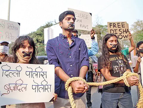 Activists demand the release of Disha Ravi, who was arrested in connection with the Google toolkit case, in Thane on Thursday | Pti