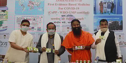 Baba Ramdev releases the first evidence-based medicine for COVID-19 by Patanjali in the presence of Union Health Minister Dr Harsh Vardhan and Union Minister Nitin Gadkari. (Photo | Shekhar Yadav)