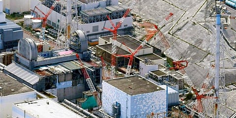 Fukushima Dai-ichi nuclear power plant's reactors, from bottom at right, Unit 1, Unit 2 and Unit 3, in Okuma, Fukushima prefecture, northeastern Japan. (Photo | AP)