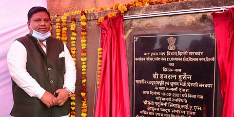 Delhi food & supply minister Imran Hussain (R) lays the foundation stone of new office complex of the legal metrology department in Vishaw Nagar. (Photo| Twitter/ @AamAadmiParty)
