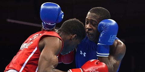 Keyshawn Davis (R) is a former Golden Gloves champion and a World Championships silver medalist. (Photo | AFP)