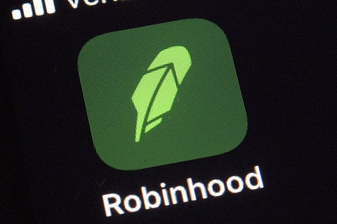 Logo for the Robinhood app on a smartphone in New York. (Photo | AP)