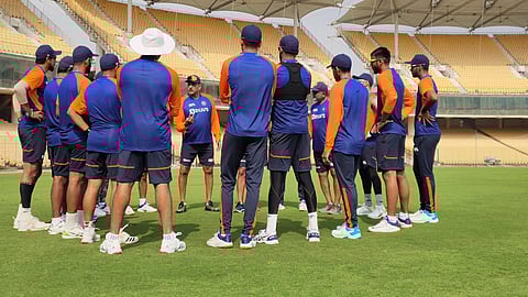 Indian cricket team players listening to coach Ravi Shashtri's address. (Photo | Twitter/BCCI)