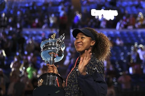 Naomi Osaka holds the Daphne Akhurst Memorial Cup trophy following her win in women's singles final match of Australian Open in Melbourne on February 20, 2021. (Photo | AFP)