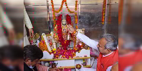 BJP state president Adesh Gupta (right) on Friday visited the temporary structure and offered prayers. (Photo| Twitter/ @adeshguptabjp)